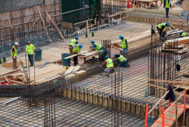 New York City, New York - May 18, 2015: Urban Scene Day, Construction Site Workers duing thair everyday hard job in New York City.