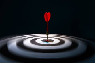 Dart in the center of dartboard